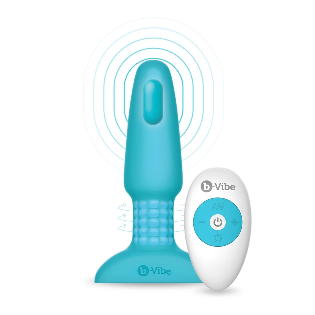 Korek analny wykonany z jasnoniebieskiego silikonu z pilotem zdalnego sterowania B-Vibe Rimming Plug