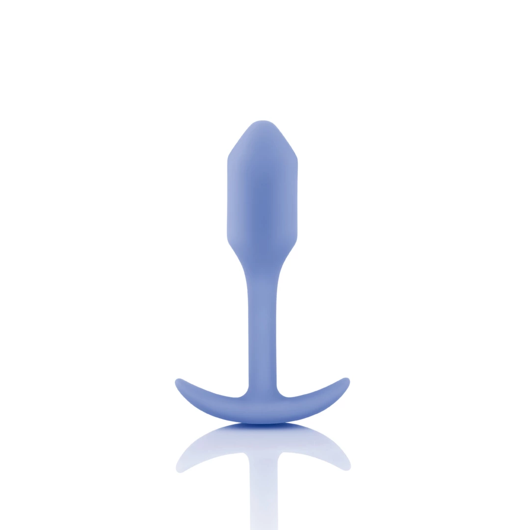 Korek analny długi wykonany z silikonu w kolorze fioletowym B-Vibe Snug Plug 1