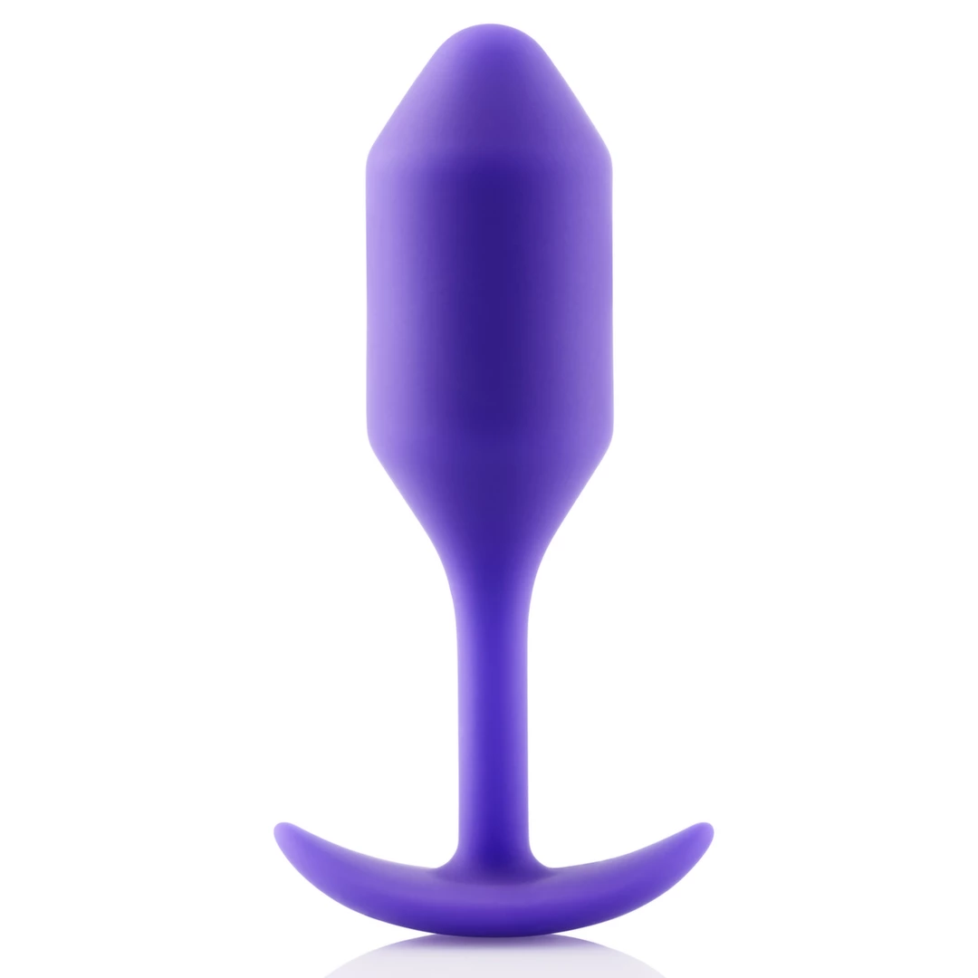 Korek analny długi wykonany z silikonu w kolorze fioletowym B-Vibe Snug Plug 2