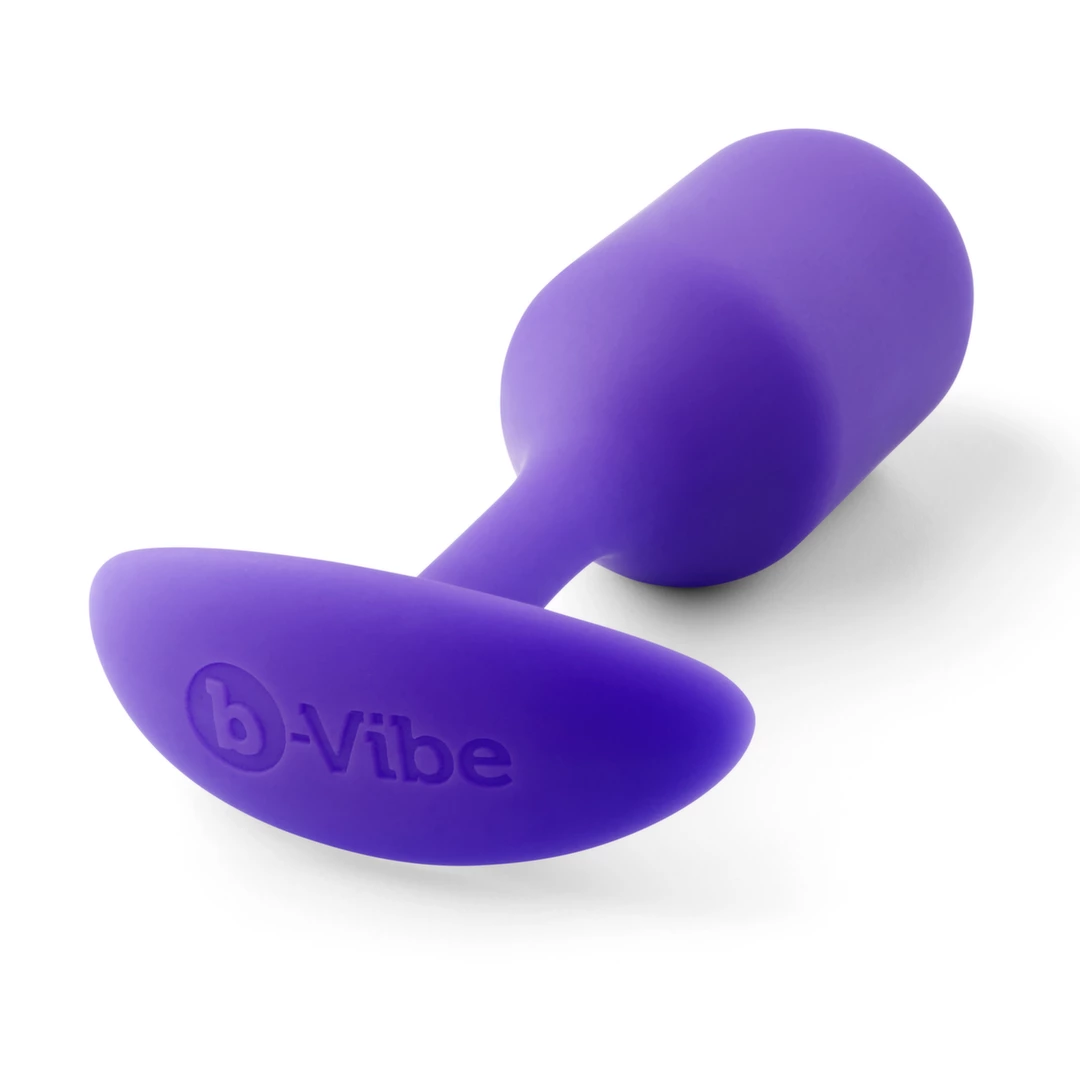 Korek analny długi wykonany z silikonu w kolorze fioletowym B-Vibe Snug Plug 2