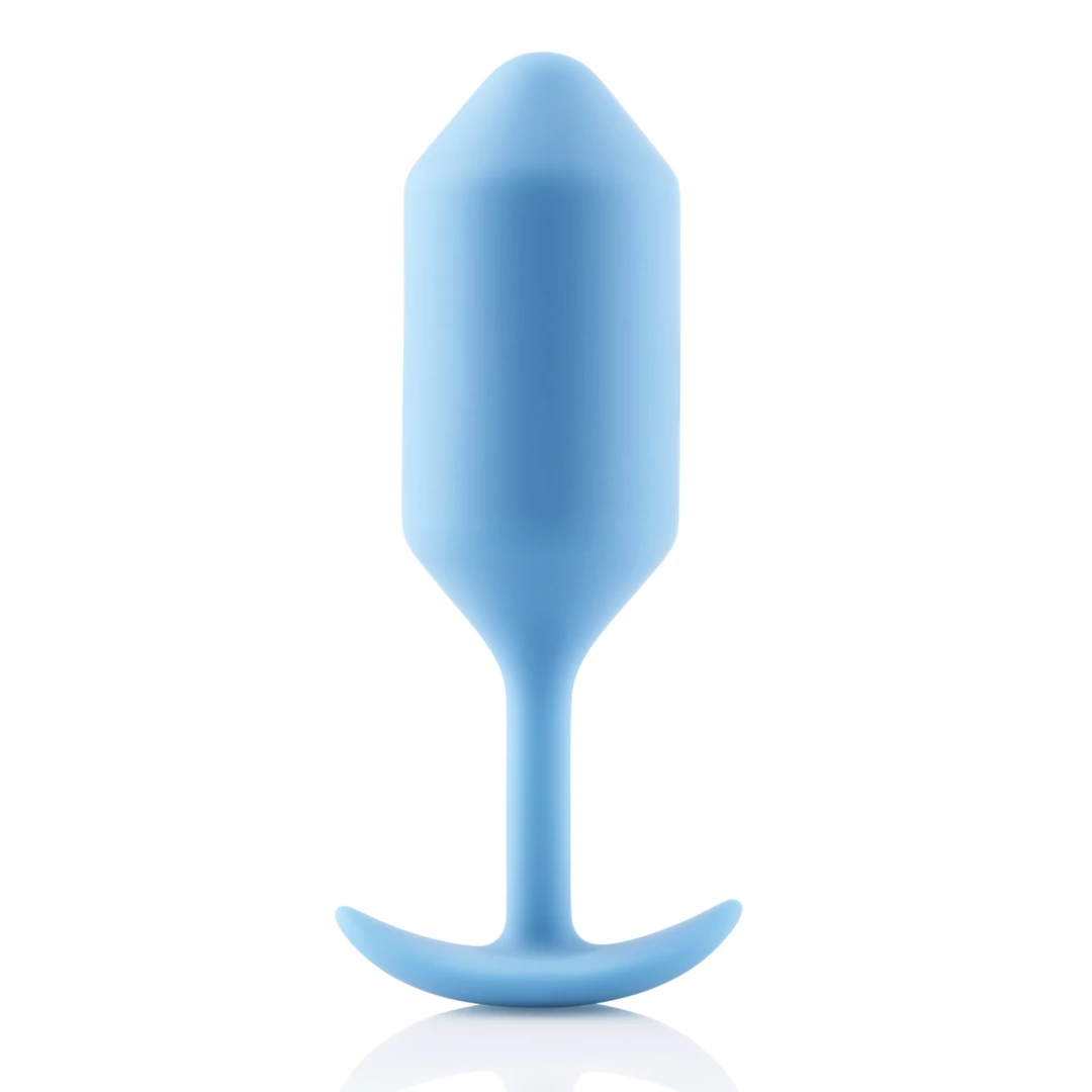 Korek analny długi wykonany z silikonu w kolorze jasnoniebieskim B-Vibe Snug Plug 3 