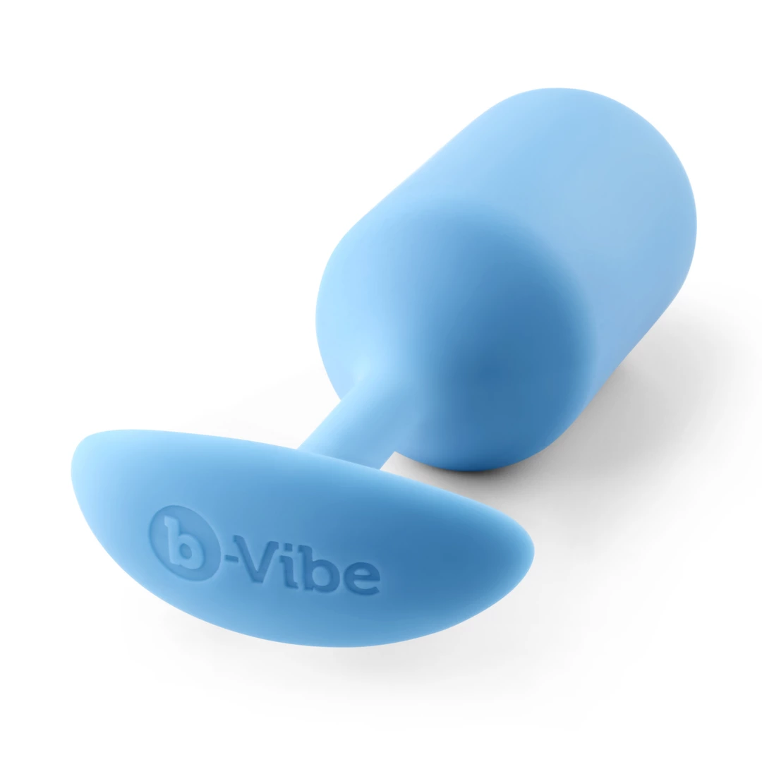 Korek analny długi wykonany z silikonu w kolorze jasnoniebieskim B-Vibe Snug Plug 3 