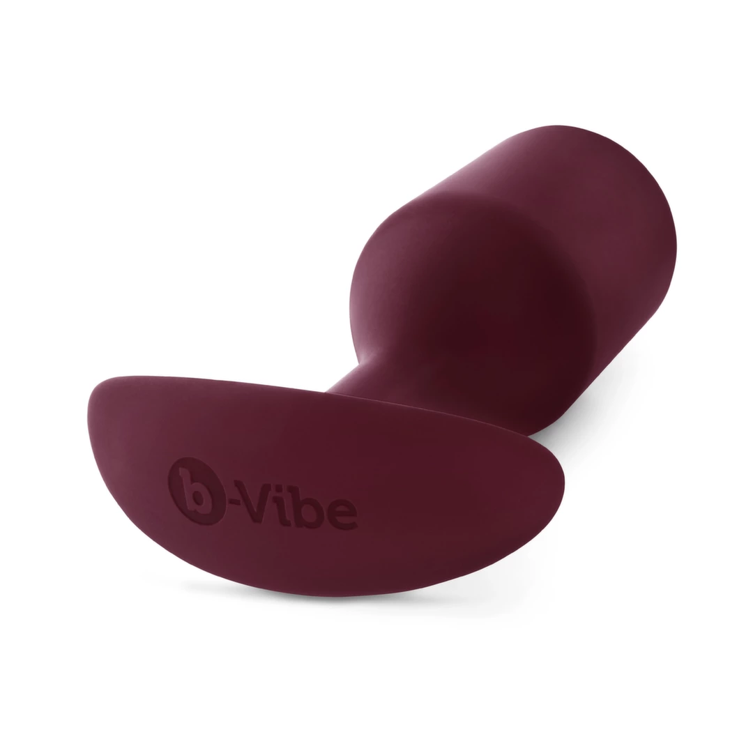 Korek analny duży wykonany z silikonu w kolorze czerwonym B-Vibe Snug Plug 5