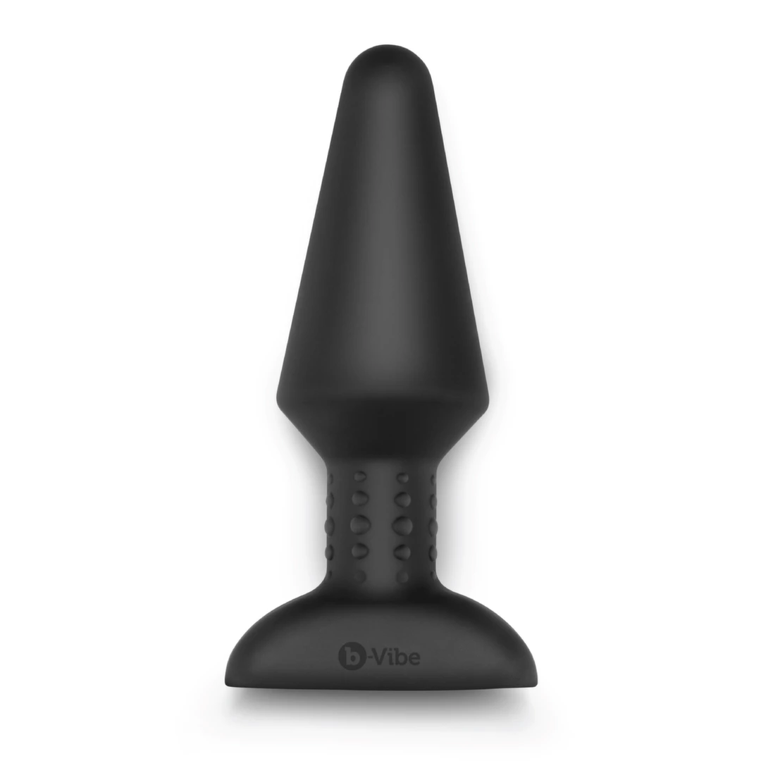 Plug analny wykonany z czarnego silikonu z pilotem zdalnego sterowania XL B-Vibe Rimming Plug