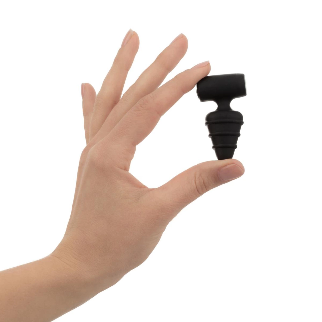 Korek analny wibrujący wykonany z czarnego silikonu z wypukłościami Love in the Pocket Love Plug