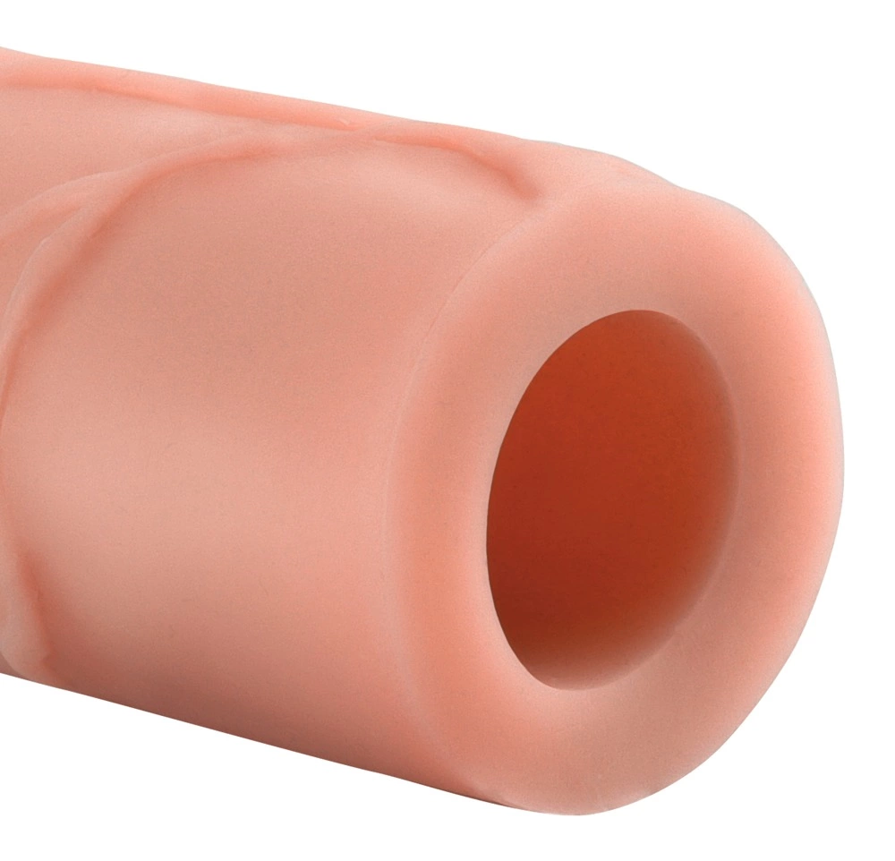 Nakładka na penisa wykonana z termoplastycznych elastomerów w kolorze beżowym z mocnymi żyłkami i mocno wyściełanym żołędzią Fantasy X-Tensions 17 cm