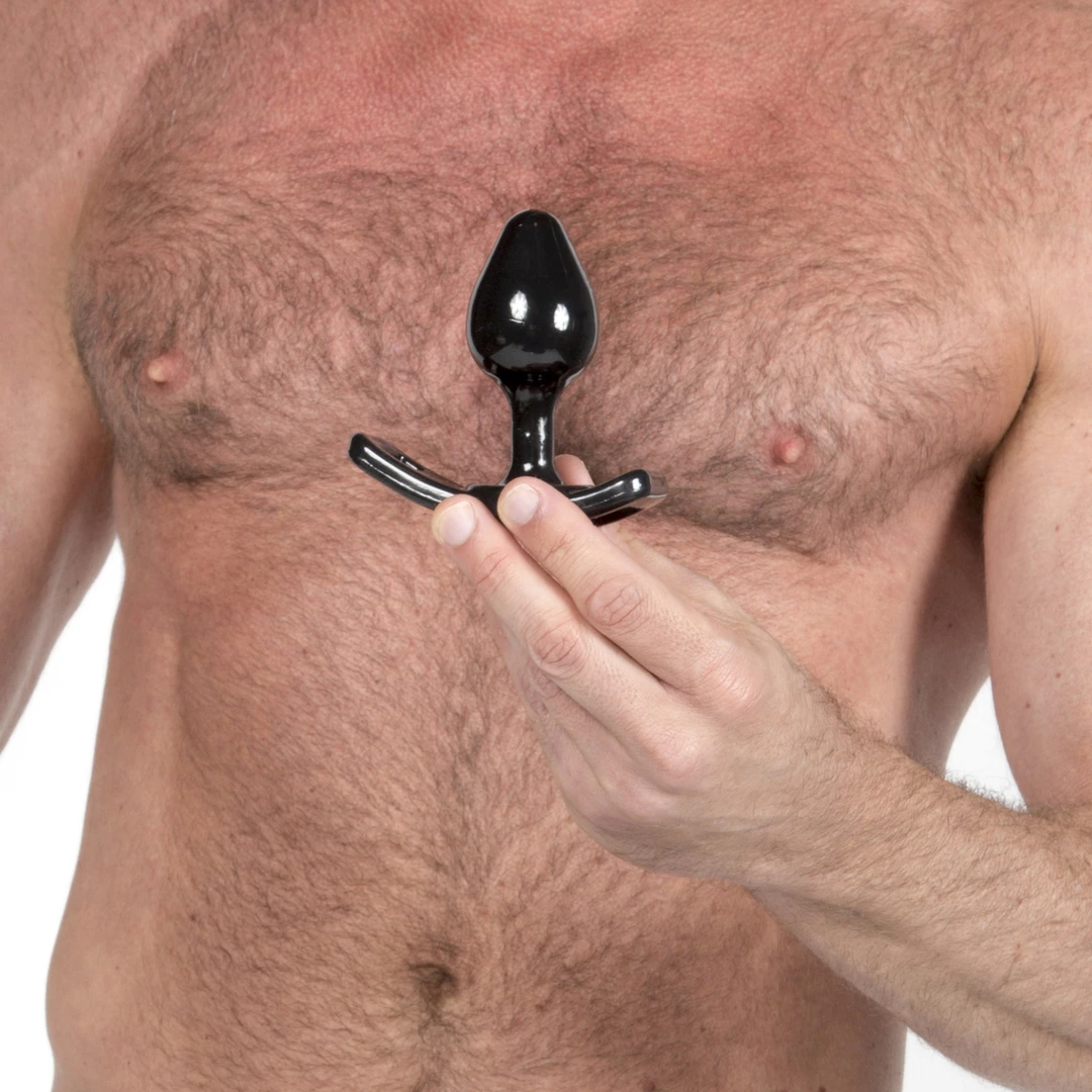 Korek analny wykonany z czarnego silikonu do straponów Perfect Fit Strap On Butt Plug