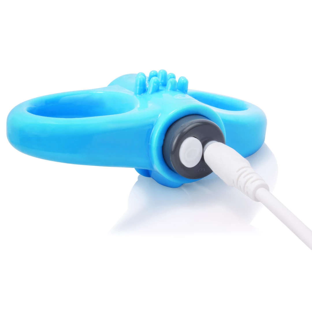 Wibrujący silikonowy pierścień na penisa w kolorze niebieskim z fakturą kolców The Screaming O Charged Yoga