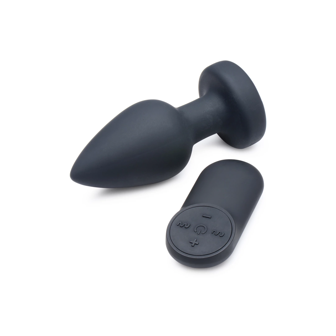 Wibrujący korek analny wykonany z czarnego silikonu z kryształem LED XR Brands 9 cm Wibrujący korek analny wykonany z czarnego silikonu z kryształem LED XR Brands 9 cm